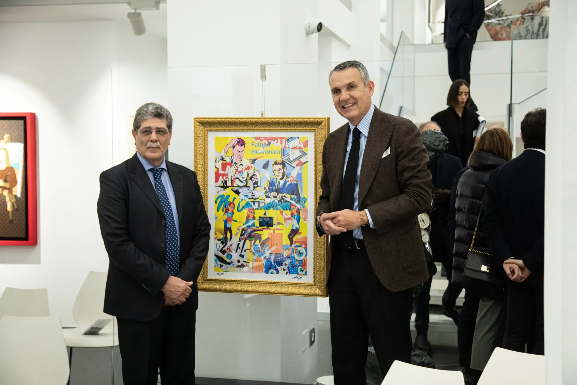 Il Dott. Giuseppe Venneri (Consigliere Nazionale del Consiglio Nazionale dei Dottori Commercialisti) e il Dott. Tiziano Giurin con l'opera I COMMERCIALISTI del Maestro Antonio Longo
